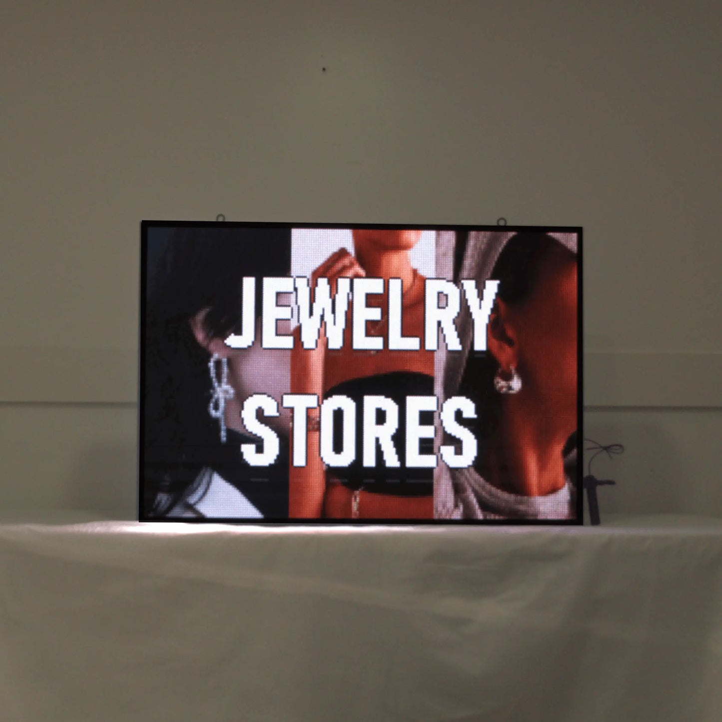 Programmable LED signs for jewelry stores displaying promotions and hours